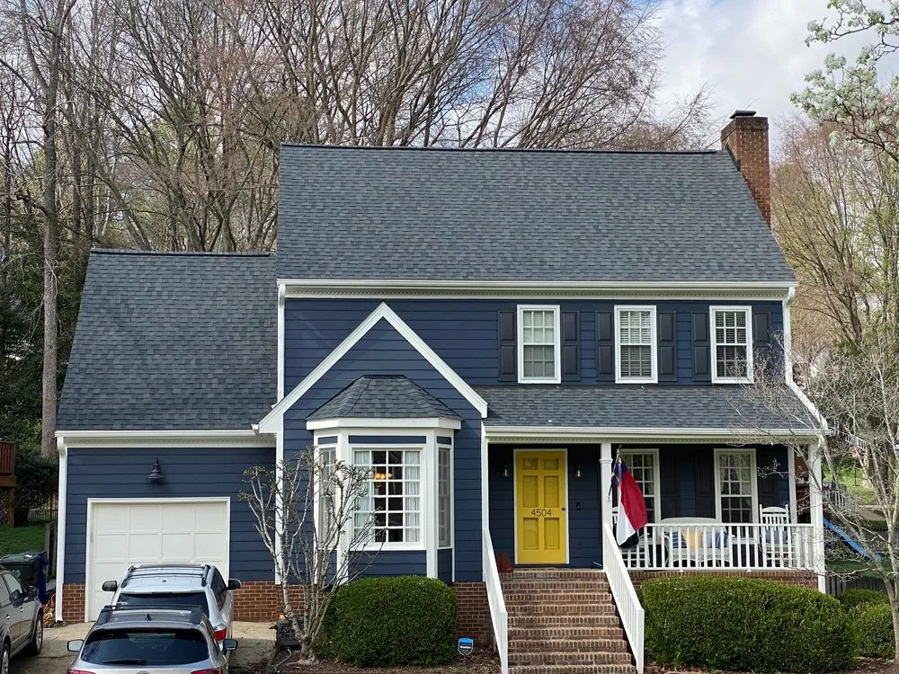 Slide of Raleigh Roofers