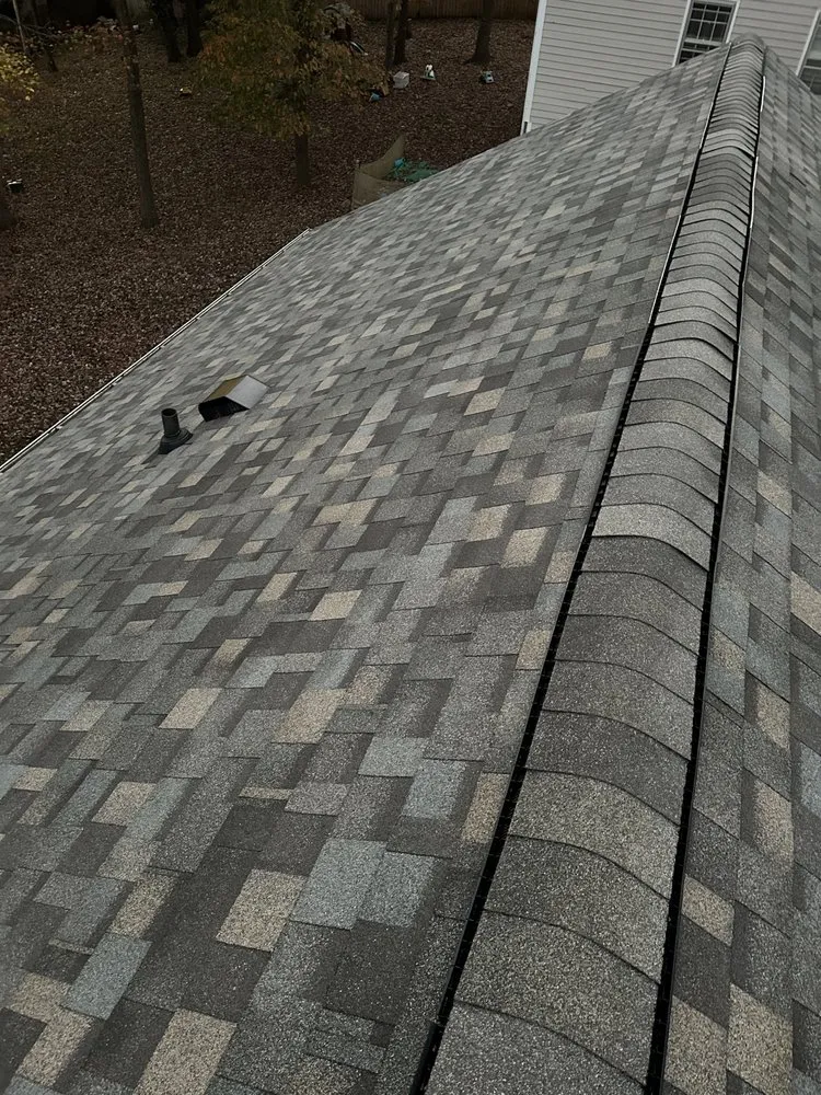 Slide of Raleigh Roofers