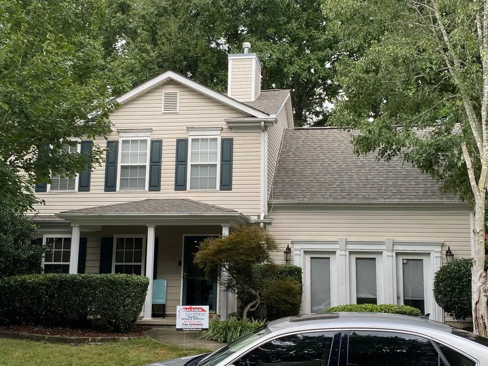 Slide of Raleigh Roofers