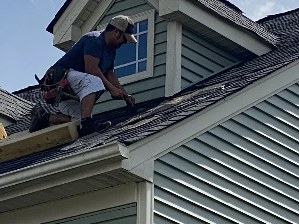 Slide of Raleigh Roofers