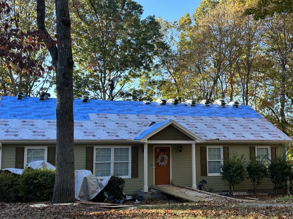 Slide of Raleigh Roofers