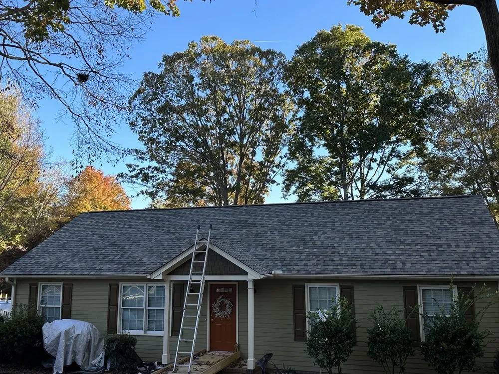 Slide of Raleigh Roofers