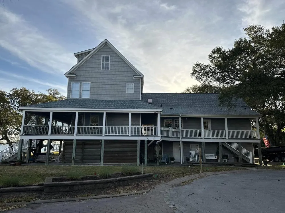 Slide of Raleigh Roofers