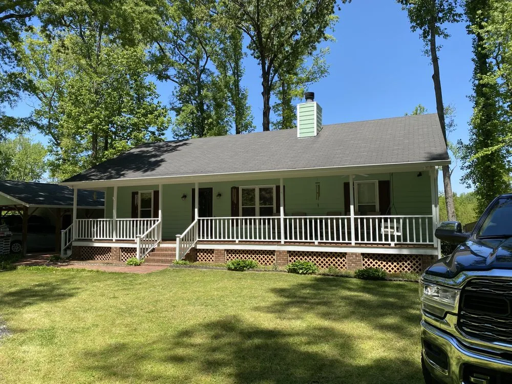 Slide of Raleigh Roofers