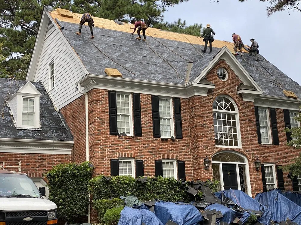 Slide of Raleigh Roofers
