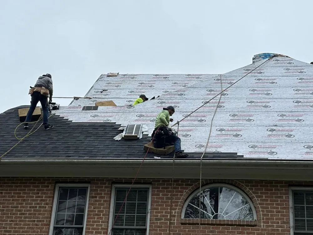 Slide of Raleigh Roofers