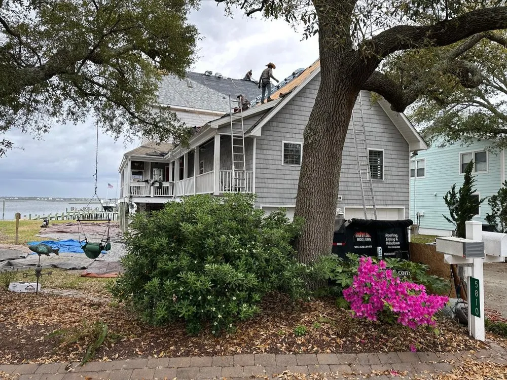 Slide of Raleigh Roofers