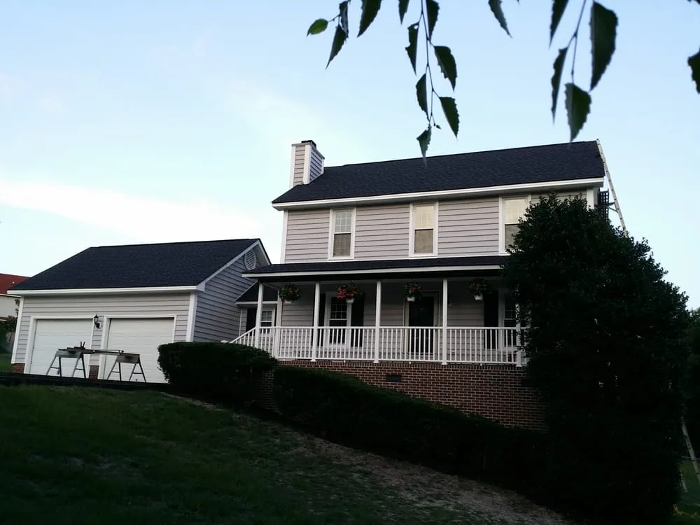 Slide of Raleigh Roofing Pro's