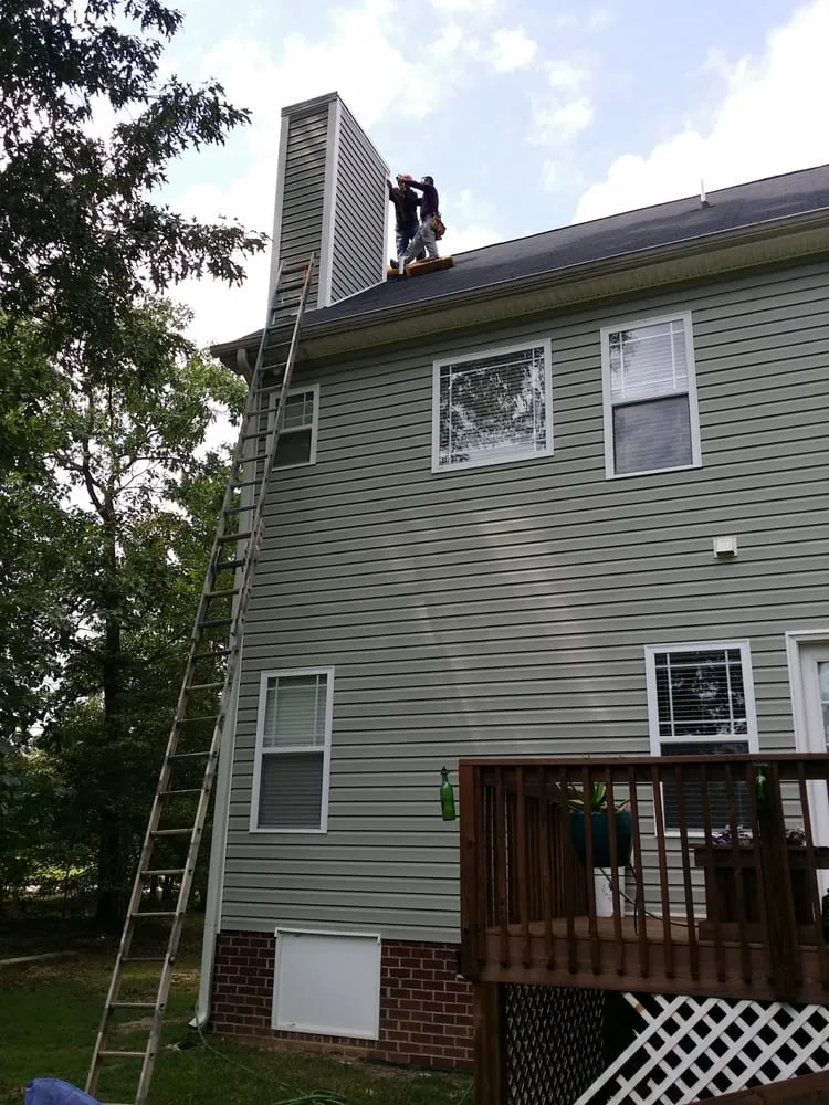 Slide of Raleigh Roofing Pro's