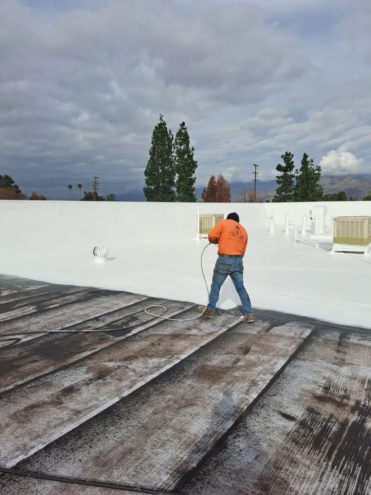 Slide of Ramon Total Roofing