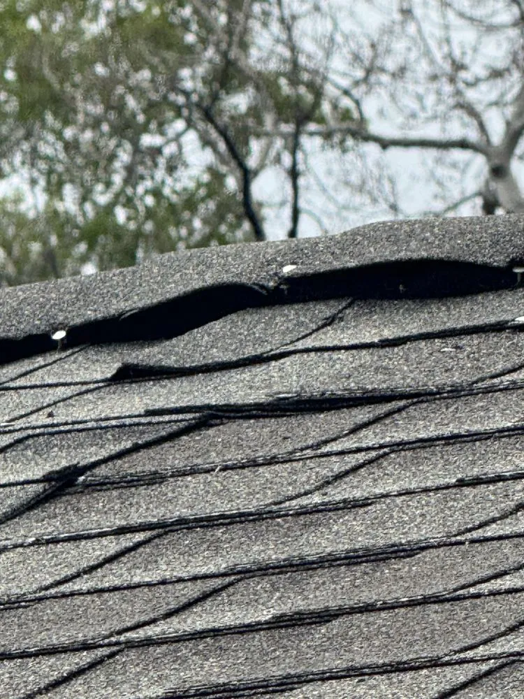 Slide of Rams Roofing & Exteriors