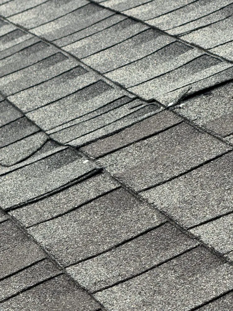 Slide of Rams Roofing & Exteriors