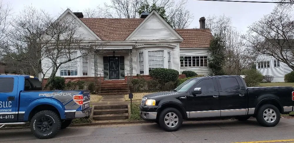 Slide of Ram's Roofing Service