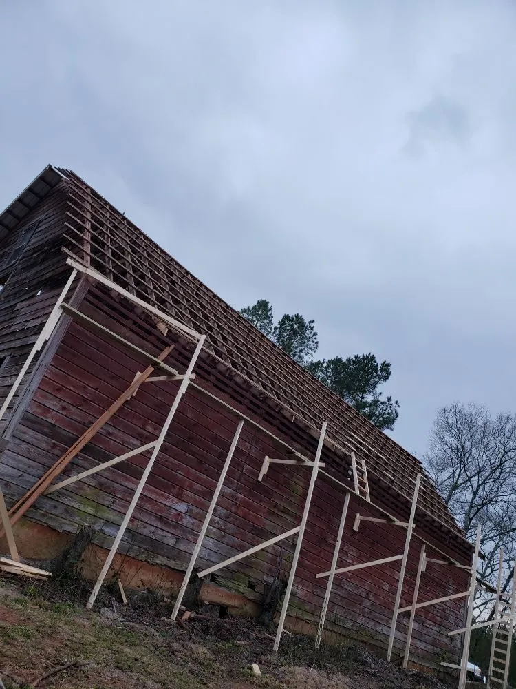 Slide of Ram's Roofing Service