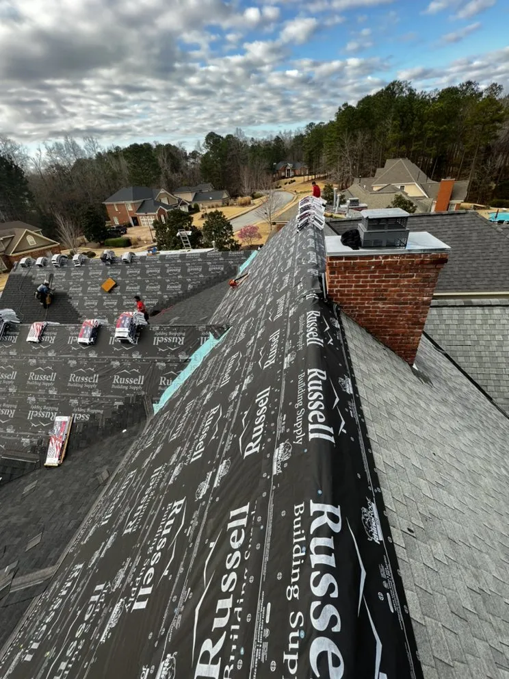 Slide of Ram's Roofing Service