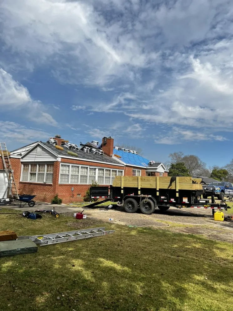 Slide of Ram's Roofing Service