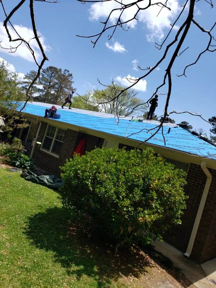 Slide of Ram's Roofing Service