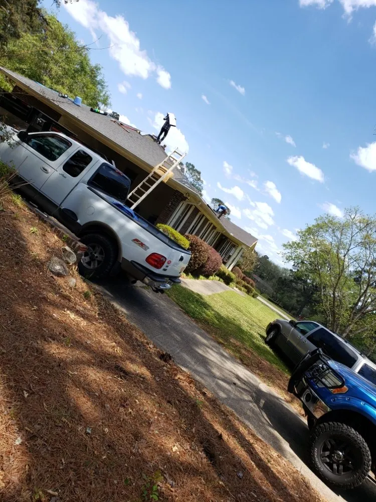 Slide of Ram's Roofing Service