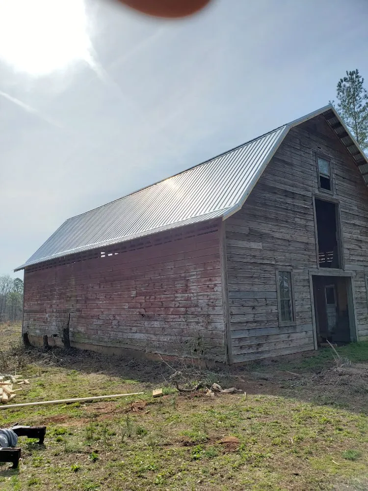 Slide of Ram's Roofing Service