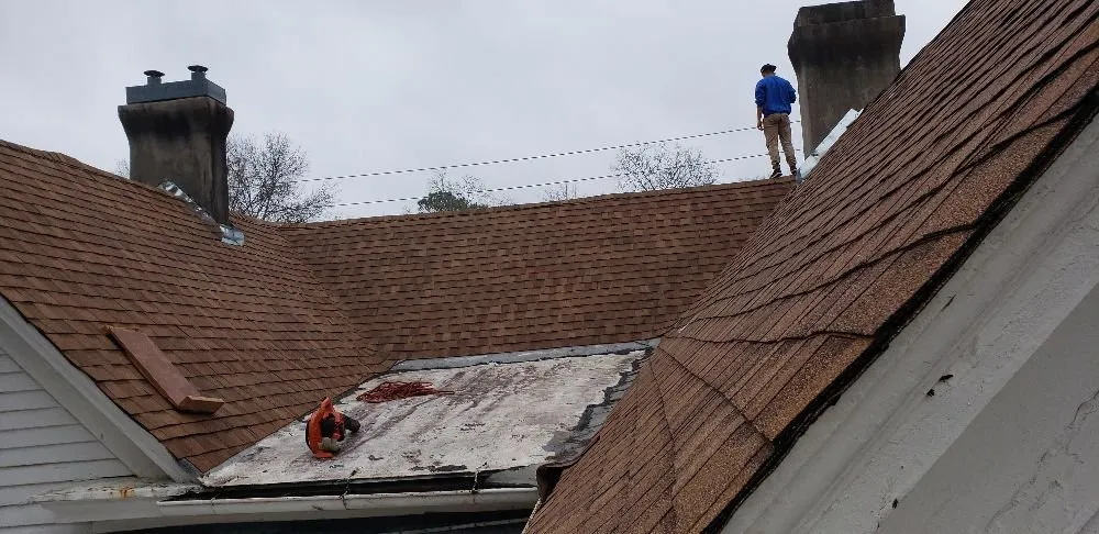 Slide of Ram's Roofing Service