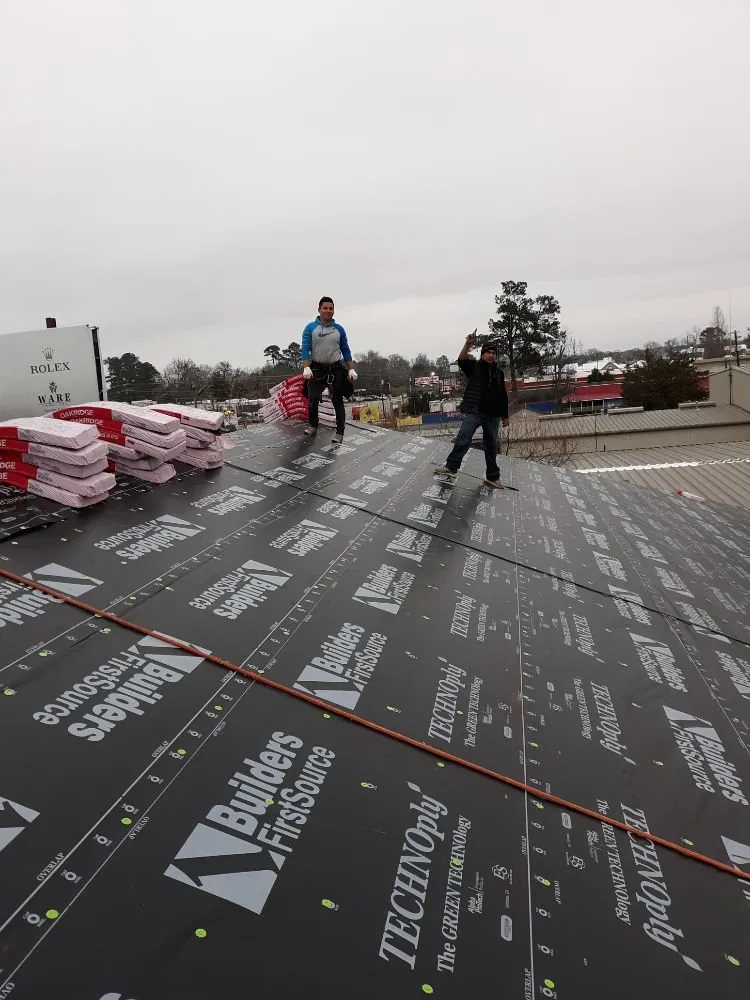 Slide of Ram's Roofing Service