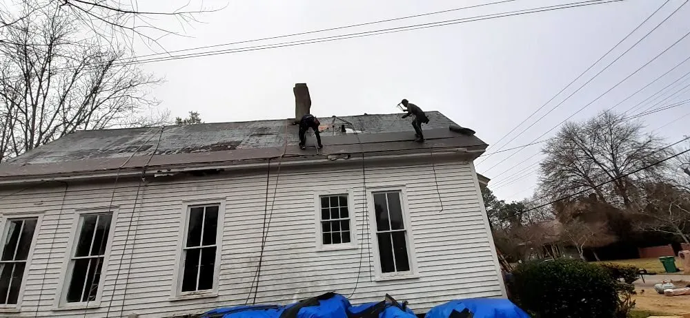 Slide of Ram's Roofing Service