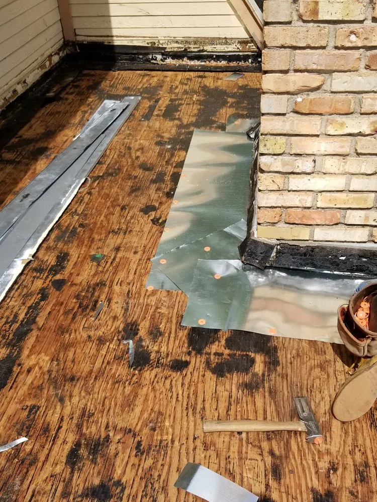 Slide of Ramsey Roofing