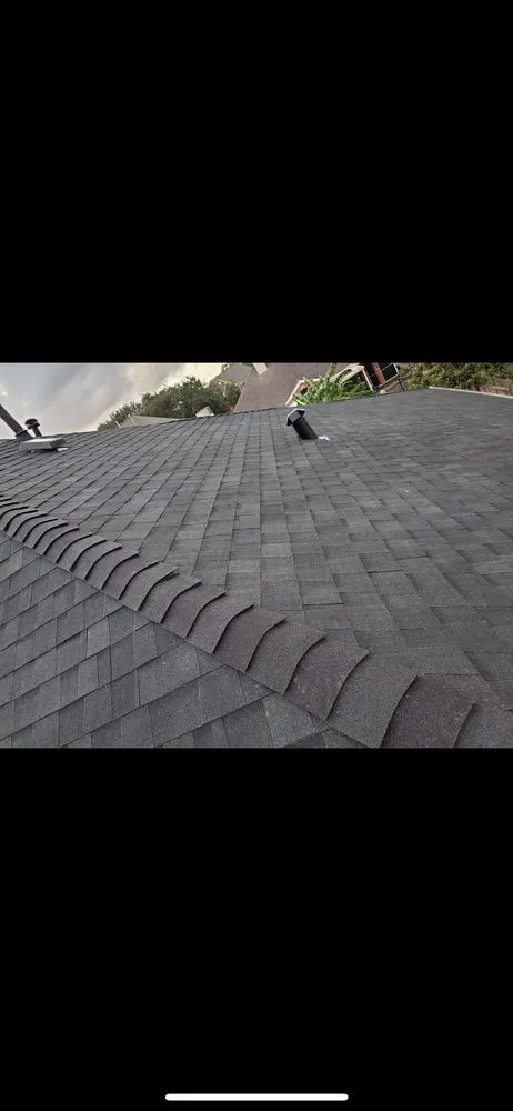 Slide of Randal’s Roofing