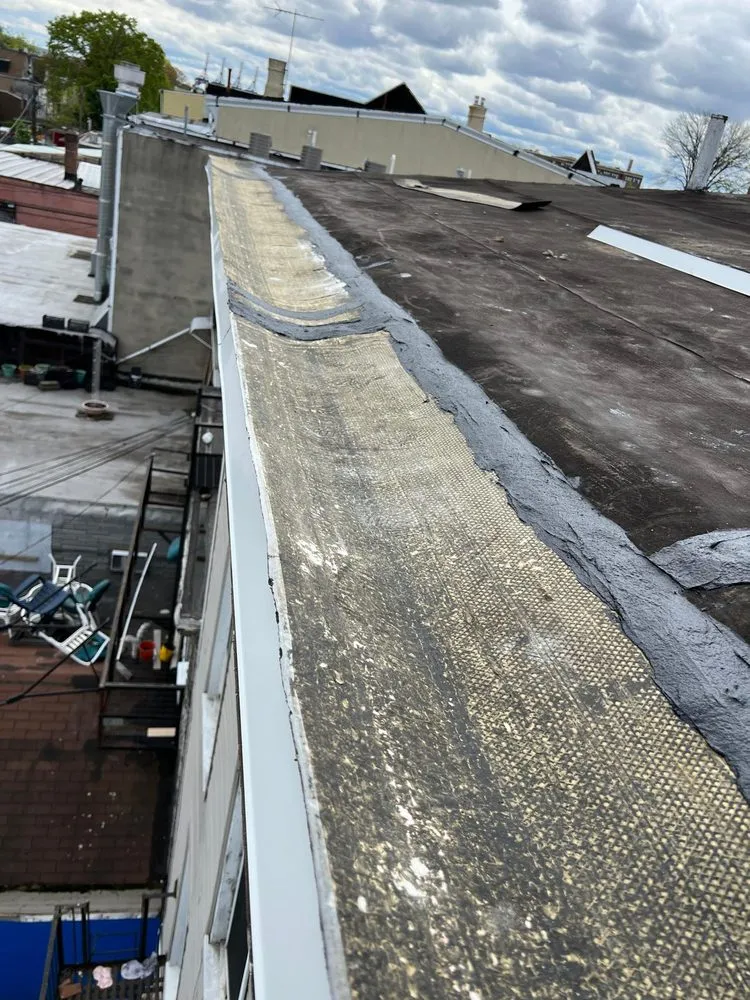 Slide of Randy's Roofing Construction