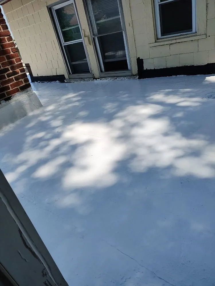 Slide of Randy's Roofing Construction