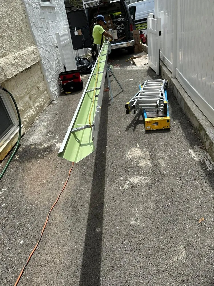 Slide of Randy's Roofing Construction