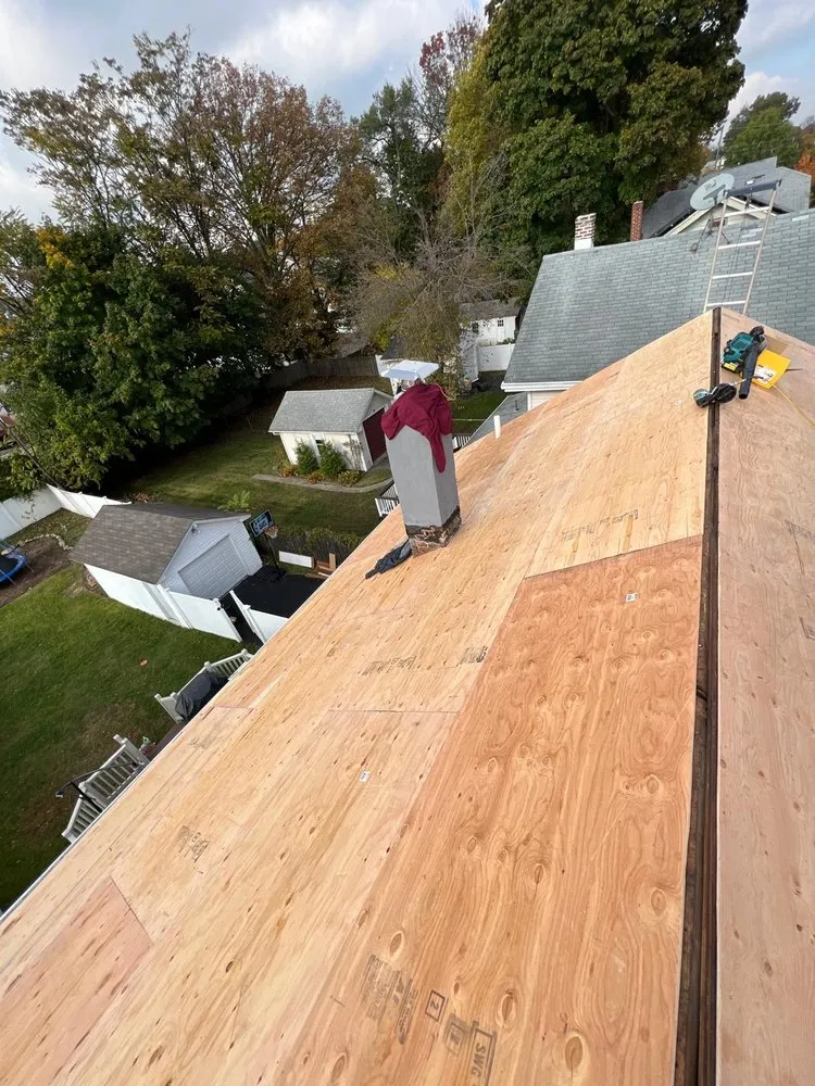 Slide of Randy's Roofing Construction