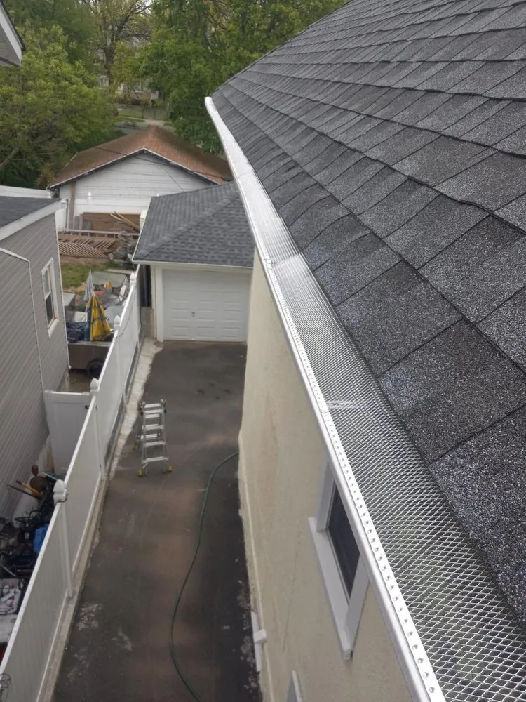 Slide of Randy's Roofing Construction