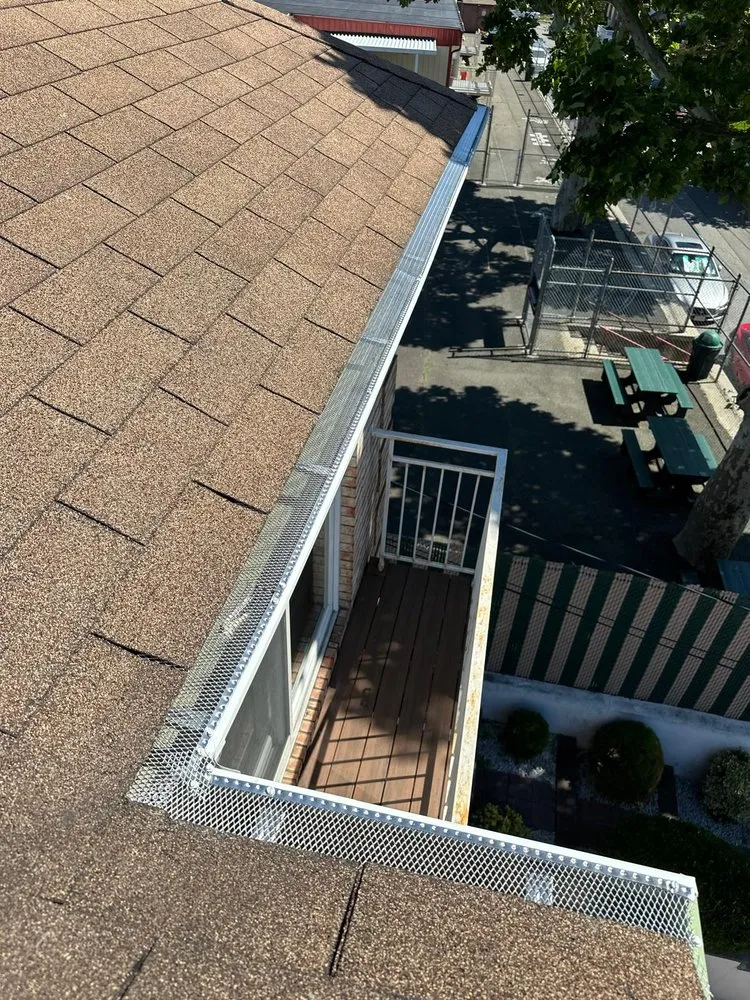 Slide of Randy's Roofing Construction