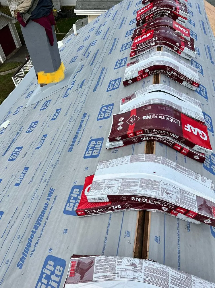 Slide of Randy's Roofing Construction