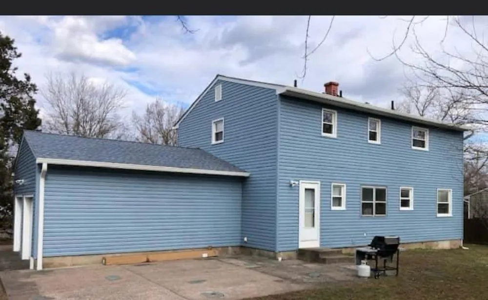 Slide of Randy's Roofing Construction