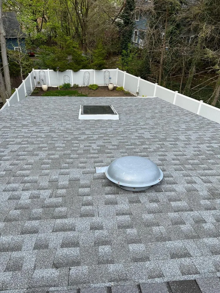 Slide of Randy's Roofing Construction