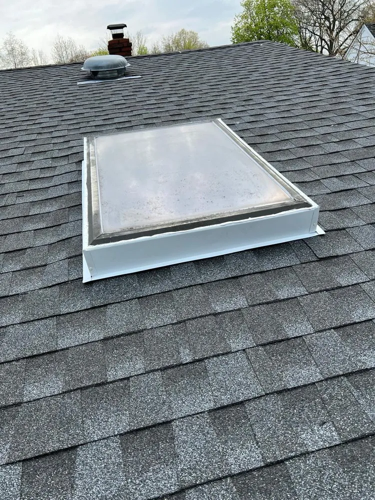Slide of Randy's Roofing Construction