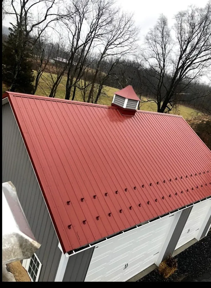 Slide of Randy's Roofing Construction