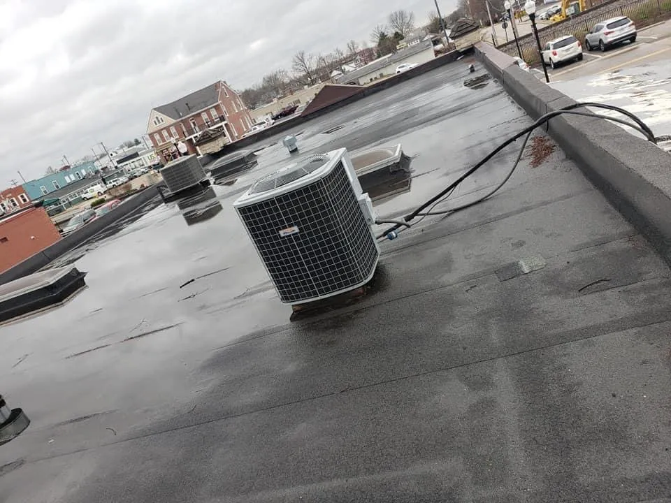 Slide of Rapid Commercial Roofing