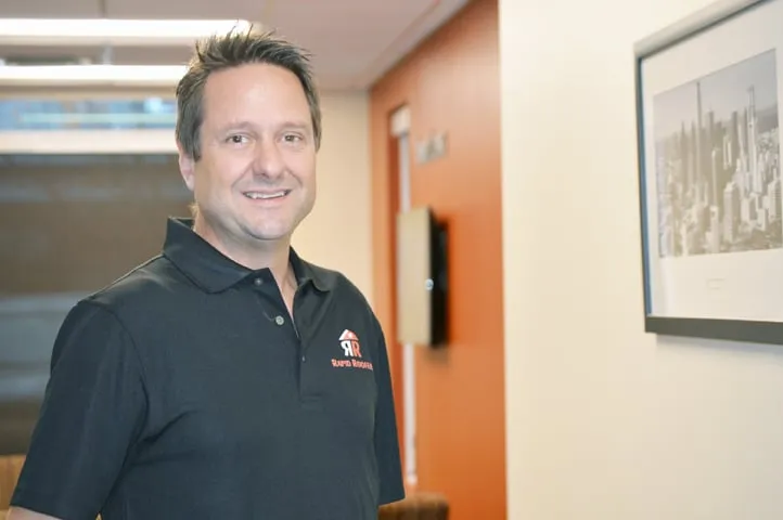 Slide of Rapid Roofers