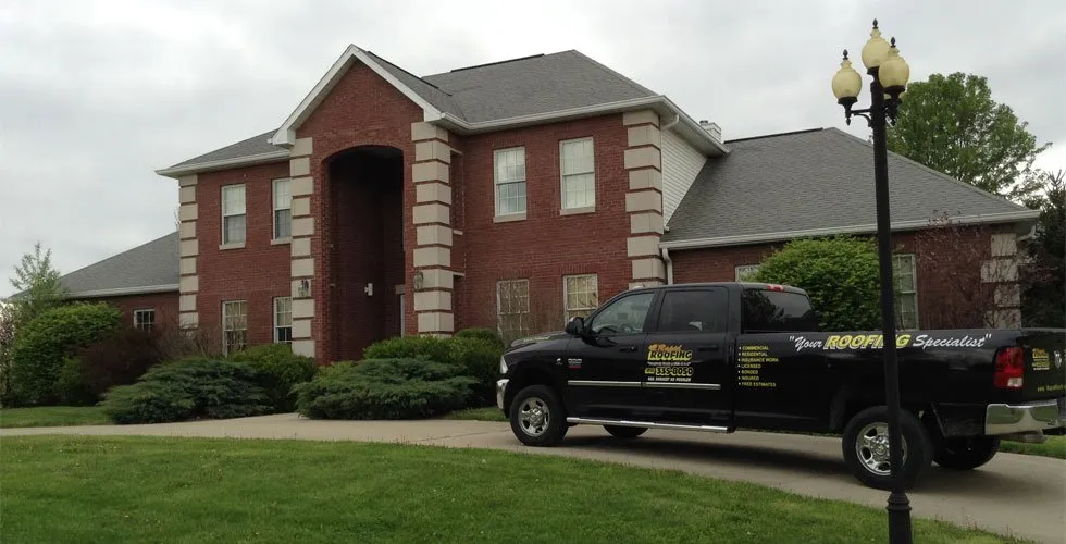 Slide of Rapid Roofing & Restoration