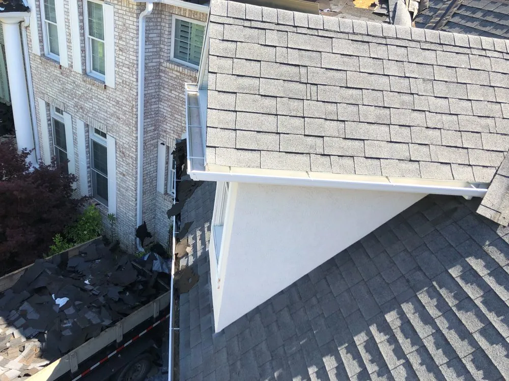 Slide of Rapid Roofing & Restoration