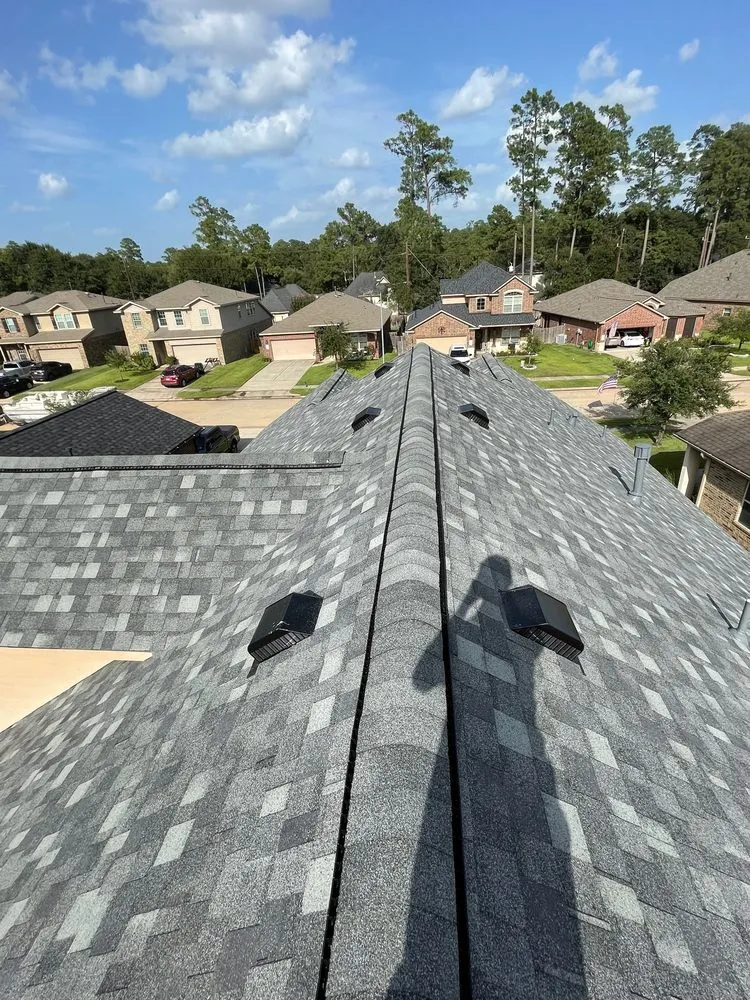 Slide of Rapid Roofing and Construction