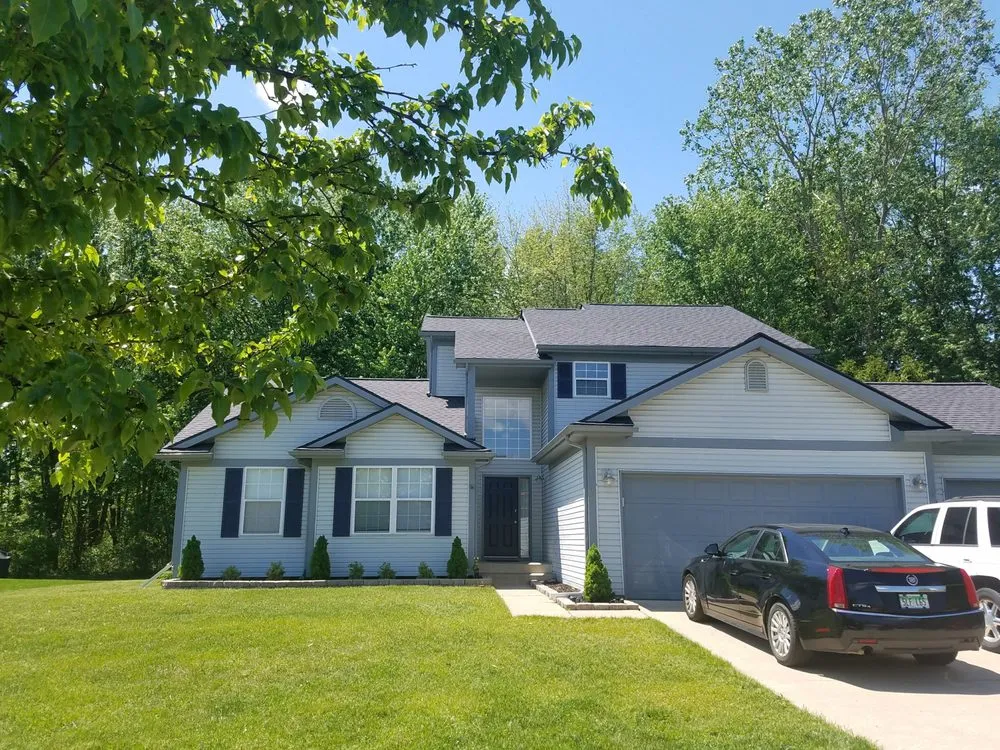 Slide of Rapid Roofing