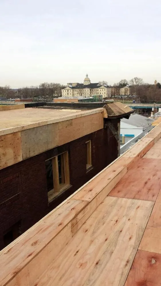 Slide of Rapid Roofing