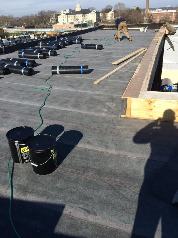 Slide of Rapid Roofing