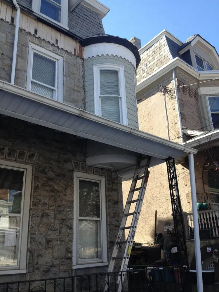 Slide of Rapid Roofing