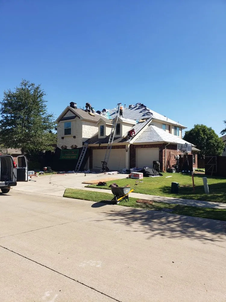 Slide of Raptor Roofing and Construction