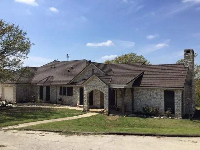 Slide of Raptor Roofing and Construction